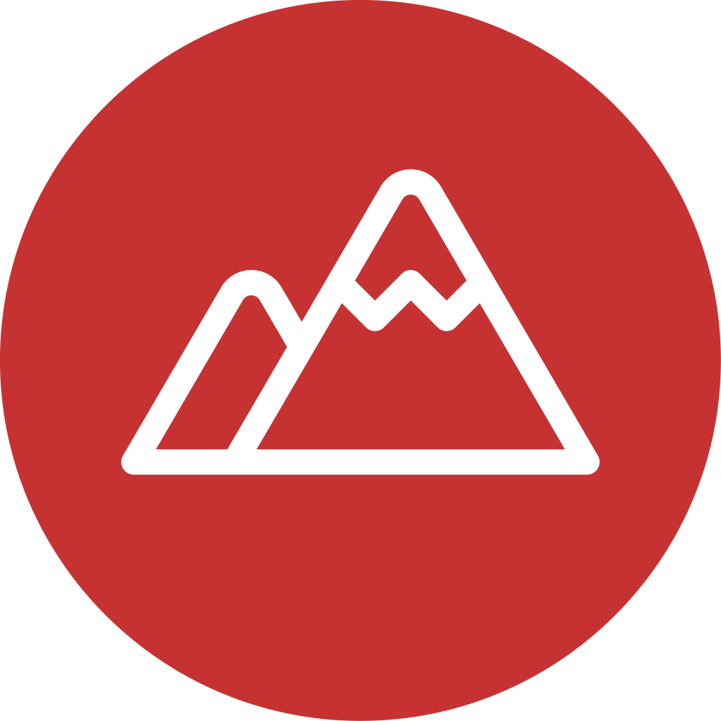 A white mountain icon with a stylized peak and valley, centered on a solid red circular background.