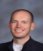 Professional headshot of Paul Erwin.