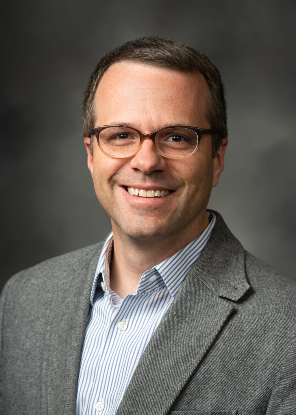 Professional headshot of CUWP Associate Director Brian Jackson